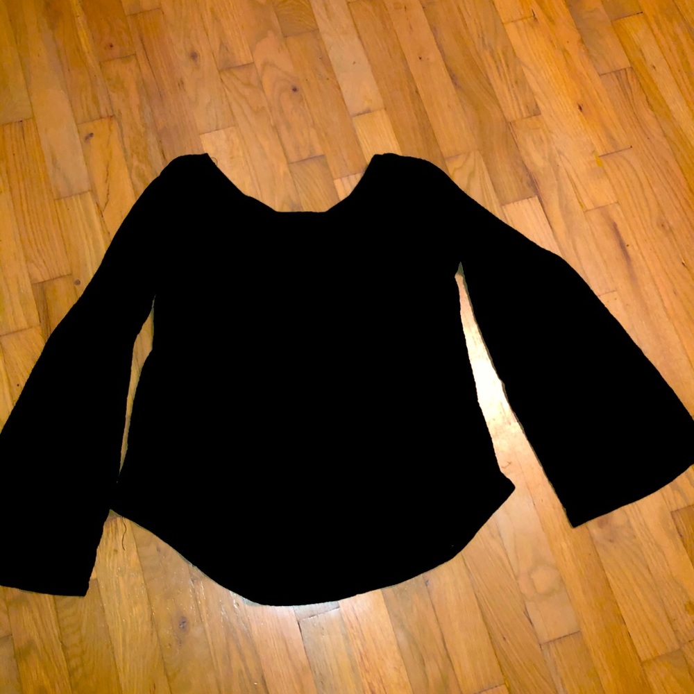 Black peasant top with bell sleeve and cross back